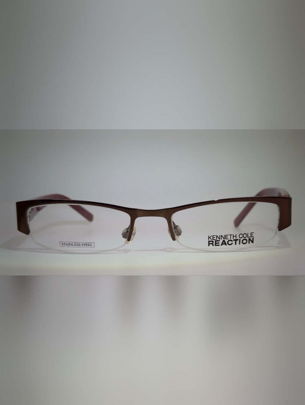 Kenneth Cole Reaction.KC 699. Rectangular Semi Rimless Purple Frame.
